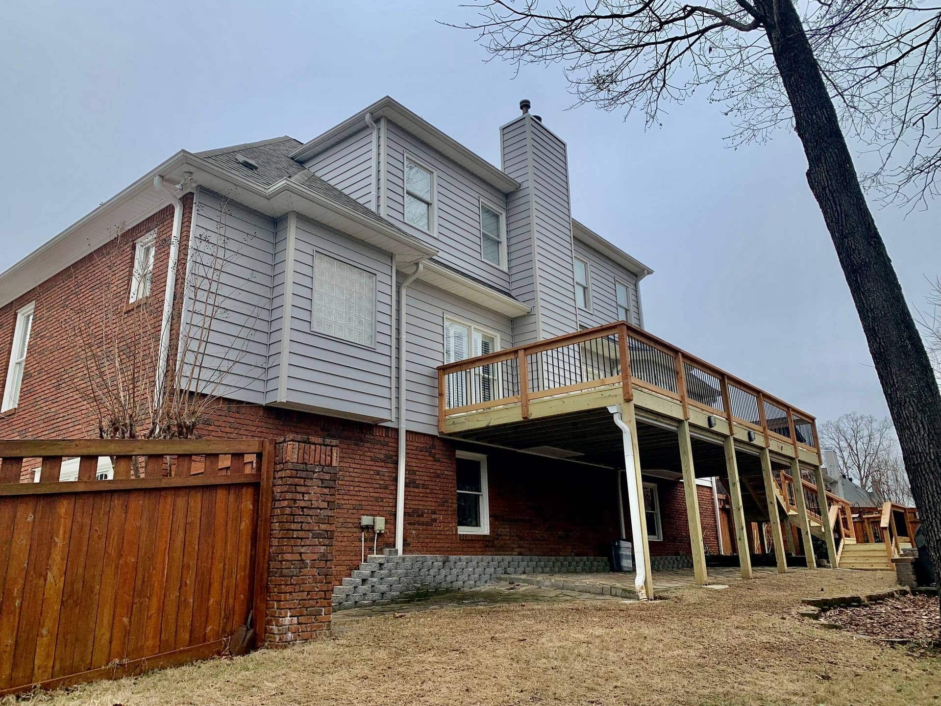 CraneBoard siding with new vinyl soffit and fascia Installation by Alabama Decks Exteriors Birmingham Hoover Pelham